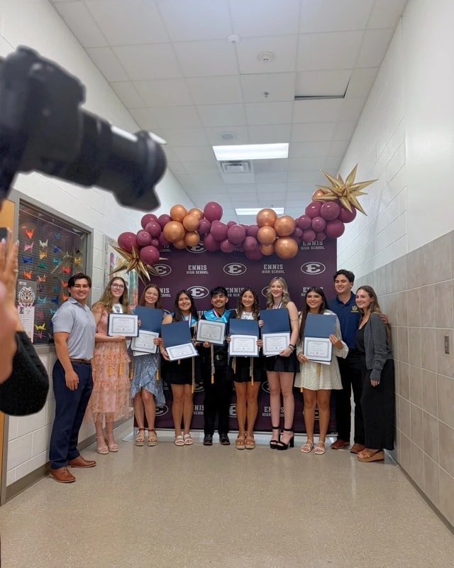 Students and community members celebrating together at Ennis High School