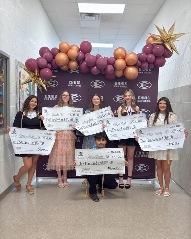 CROME scholarship recipients holding their awards