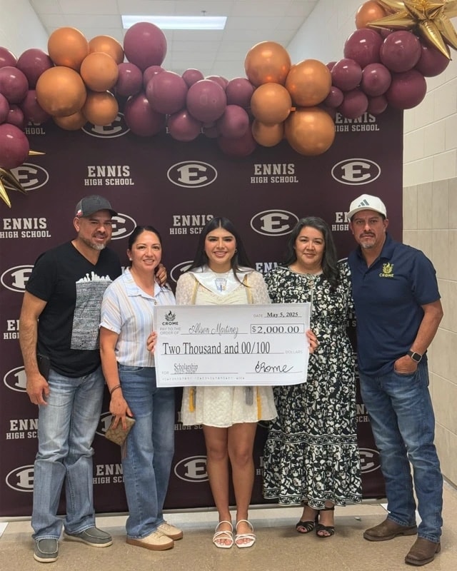A CROME scholarship recipient celebrating with her family